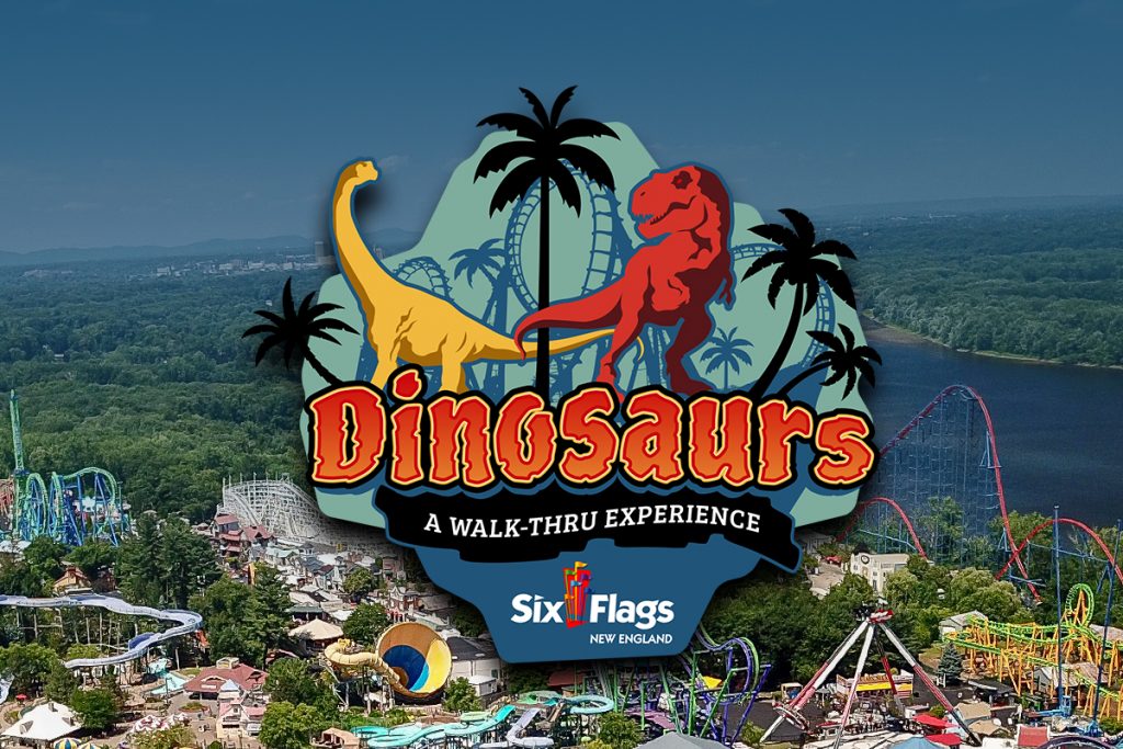 Dinosaurs A Walk Thru Experience logo at Six Flags New England with rides in background
